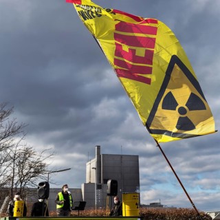 Banner with sign for radioactivity and the word No