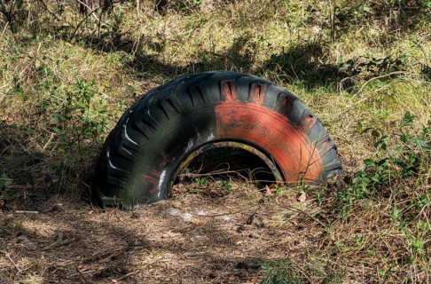 Environmental pollution caused by an old truck tyre