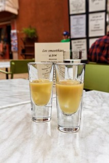 Two glasses of Pastis with ice on a table in the restaurant