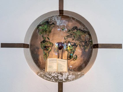 Wall cross with glass globe