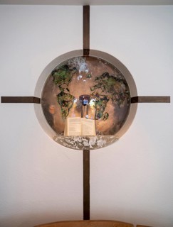 Wall cross with glass globe
