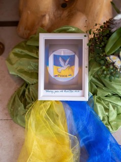 Picture with peace dove and flag of Ukraine in the national colours yellow and blue