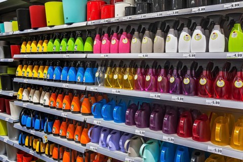 Shelf with spray bottles