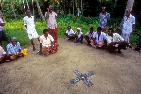 Village men playing dice game Pakida kali in Kodungallur