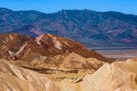 Coloured rock formations in the evening light at Zabriskie Point