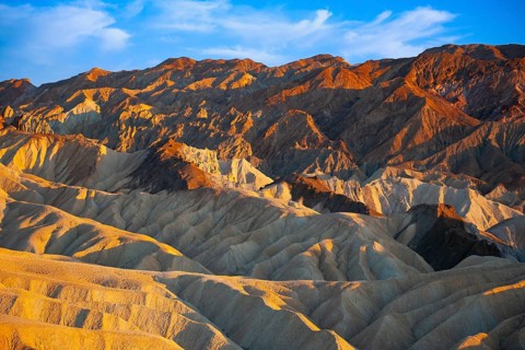 Coloured rock formations in the evening light at Zabriskie Point