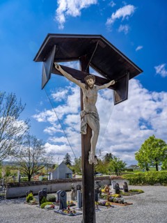 Crucifix in the cemetery of the Catholic parish church of St. George
