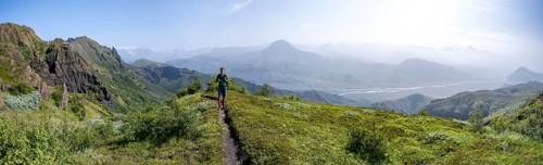 Hikers on trail at the ridge of Tindfjoell