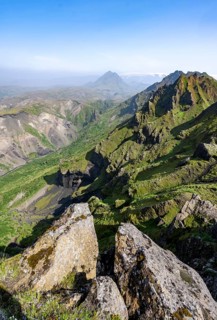 Pointed green mountain peaks on the ridge of Tindfjoell