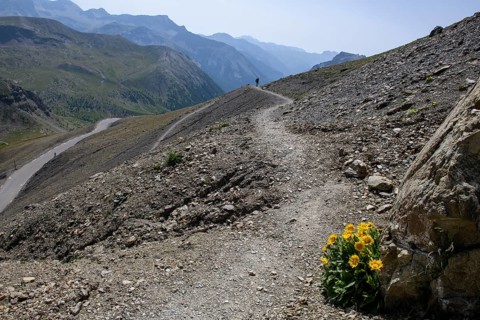 Footpath from left highest paved road in the Alps at 2862 metres high Cime de la Bonette