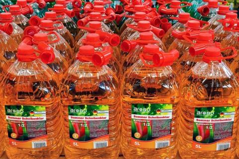 Plastic bottles with disc clear in a DIY store