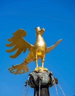 Golden eagle on the market fountain on the market square
