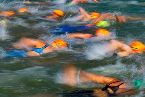 Swimmers compete in the 27th Stadttriathlon in Erding