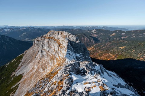 Summit ridge with first snow in autumn