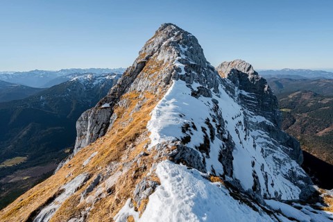 Summit ridge with first snow in autumn