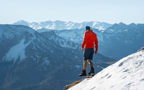 Mountaineers in front of snow-covered mountains