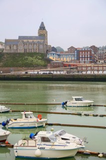 Coastal village of Le Treport at the mouth of the Bresle on the English Channel with Saint-Jacques church