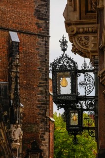 Wrought-iron lights on historic house at corner of Kramerstrasse Marktplatz
