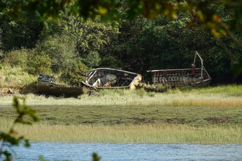 Wrecks of former fishing boats at the Anse du Moulin Neuf inlet