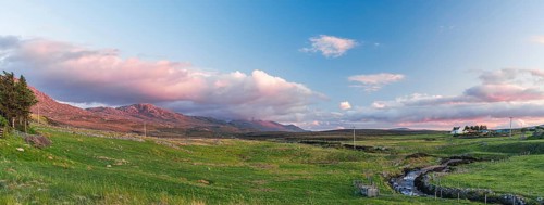 Sunset of Mountain and Meadows over Smoo Cave