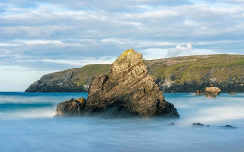 Rocks on Sango Sands Beach Bay Durness in long exposure