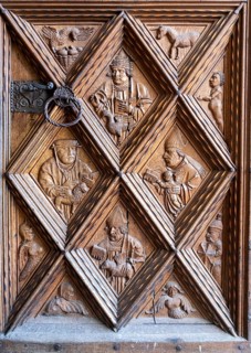 Richly decorated wooden portal of the collegiate parish church of St. Philip and St. James