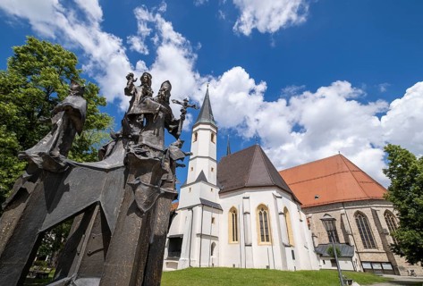 Fountain in front of the collegiate parish church of St. Philip and St. James in the pilgrimage town of Altoetting