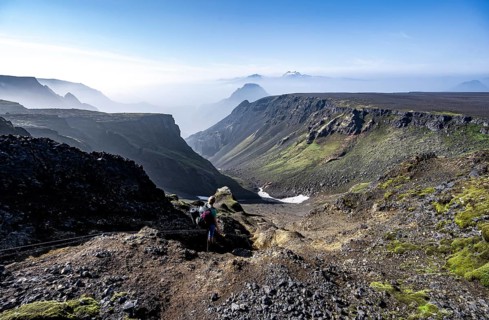 Hiker at the hiking trail Fimmvoerouhals