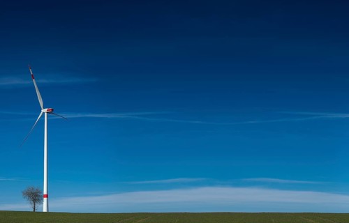A windmill in the field with copy space