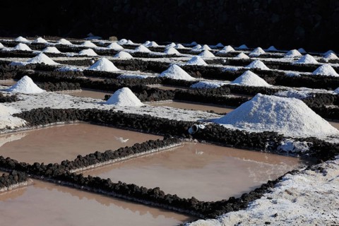 Crystal pools and salt mountains of the salt works in Fuencaliente at the Punta de Fuencaliente