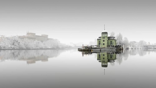 Snowfall and fog at the Helmovsky Jez hydroelectric power plant power station in Prague