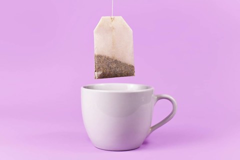Tea bag and cup,