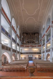 Georgenkirche, interior with baptismal font and organ