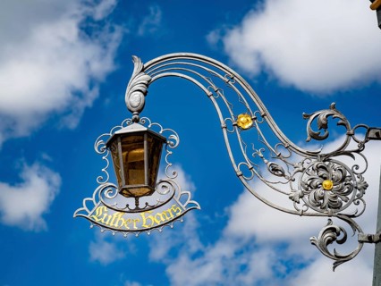 Lamp with nose sign at the Luther House in Eisenach. This is where the reformer Martin Luther lived with the Cotta family during his school years from 1498-1501, today museum