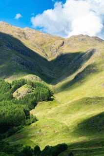 Mountains in Lights and Shadows over Glenfinnan Viaduct, West Highland Line in Glenfinnan
