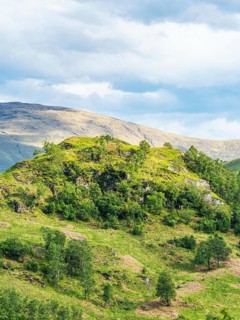 Mountains in Lights and Shadows over Glenfinnan Viaduct, West Highland Line in Glenfinnan