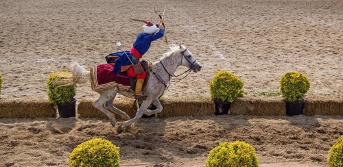 Ottoman archer riding and shooting on horseback,