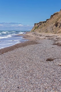 Shingle beach, steep coast