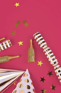 Party hats, small golden champagne bottles