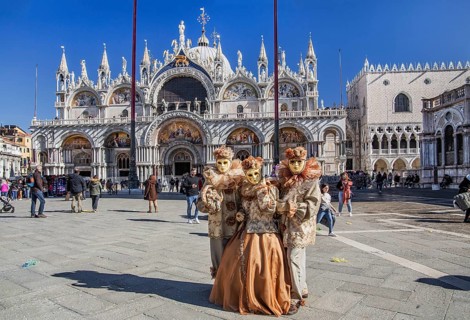 St. Mark's Square with Carnival Masks in front of St. Mark's Basilica, Venice
