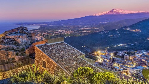 Chapel Madonna della Rocca above the village with Etna 3357m at sunrise, Taormina