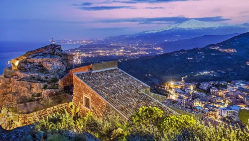 Chapel Madonna della Rocca above the village with Etna 3357m at dusk, Taormina