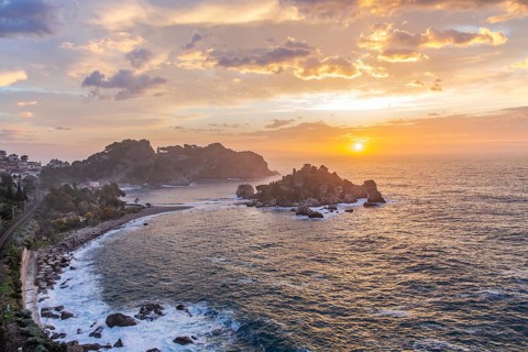 Coastal landscape with Isola Bella in spring at sunrise, Taormina