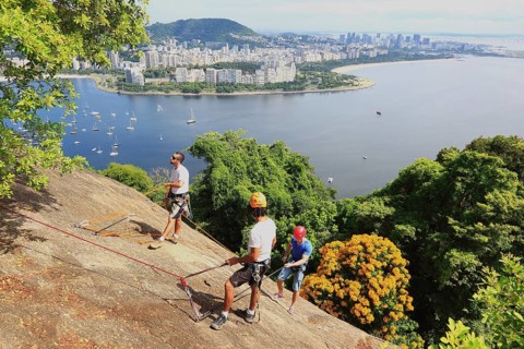 Climbers practising on Sugar Loaf Mountain, Pao de Acucar