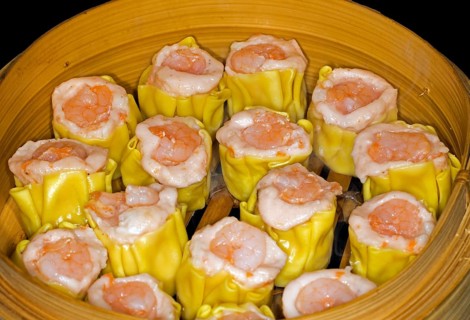 Dim Sum with fish farce and prawns, food photography with black background
