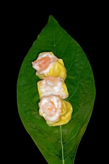 Dim Sum with fish farce and prawns, food photography with black background
