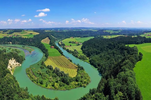 Aerial view of the river loop on the Iller near Altusried. A dreamlike landscape in the foothills of the Alps. Altusried, Upper Allgaeu