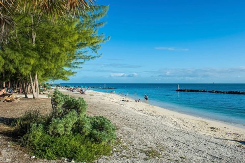 American flag at backlight, Beach in Fort Zachary Taylor historic state park