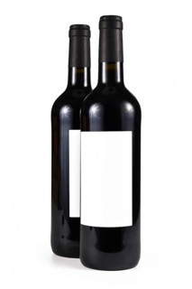 Two wine bottles with blank label isolated on white background,