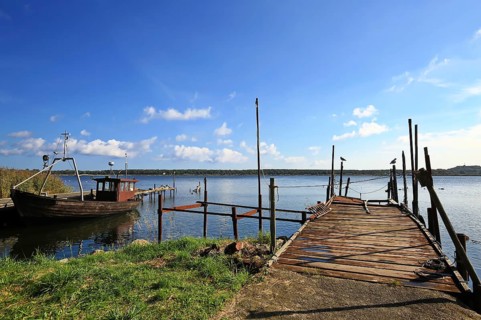 Klein Zicker jetty dreamlike landscape on the Baltic Sea island of Ruegen. Moenchgut, Mecklenburg-Western Pomerania